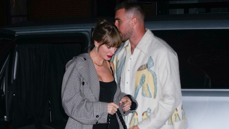 Taylor Swift and Travis Kelce canoodling