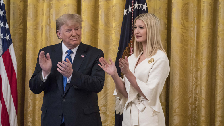 Donald Trump and Ivanka Trump clapping