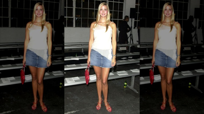 Ivanka Trump wearing a white top and denim skirt at Behnaz Sarafpour's 2002 New York Fashion Week show