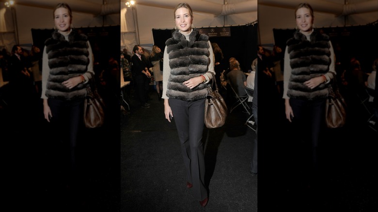 Ivanka Trump wearing a fur vest and black trousers at Dennis Basso's Fall 2012 Mercedes-Benz Fashion Week show