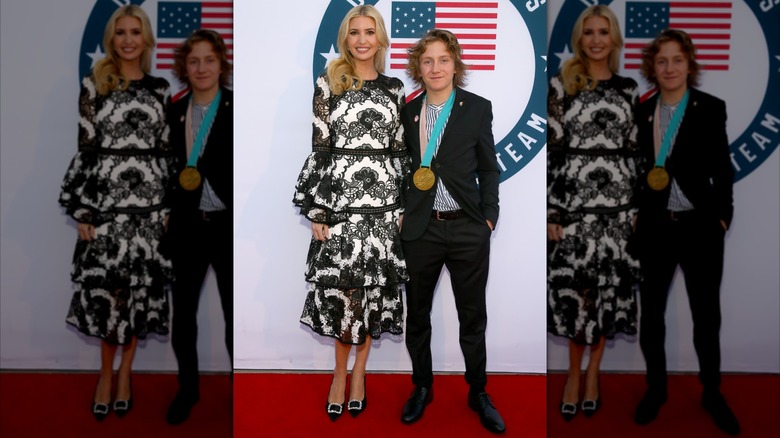 Ivanka Trump wearing a black and white dress and posing with Red Gerard at the Team USA Awards