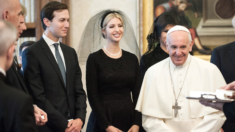 Jared Kushner and Ivanka Trump smiling with Pope Francis at the Vatican