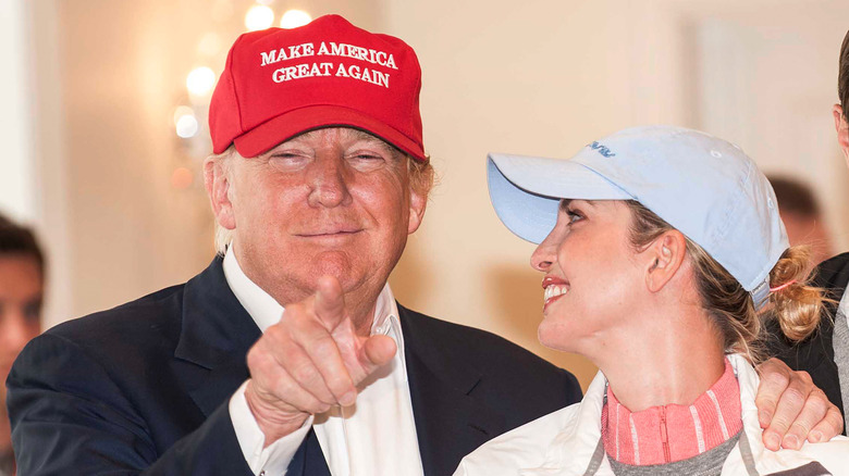 Ivanka Trump smiling back at Donald Trump