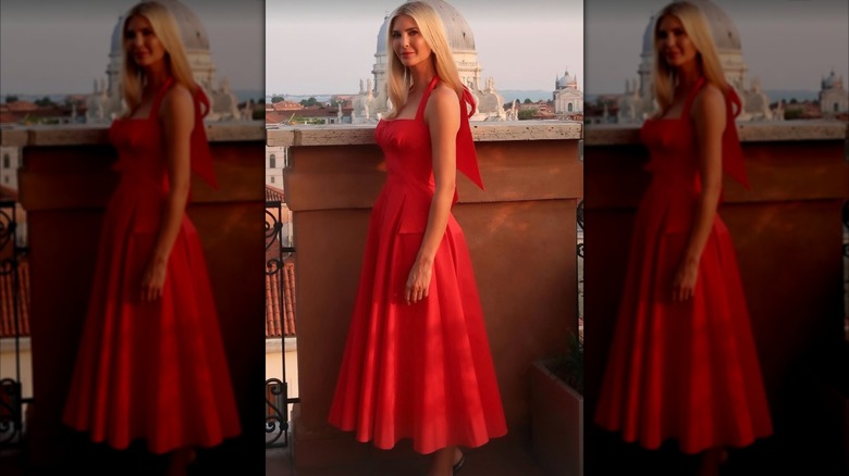 Ivanka Trump posing in red dress