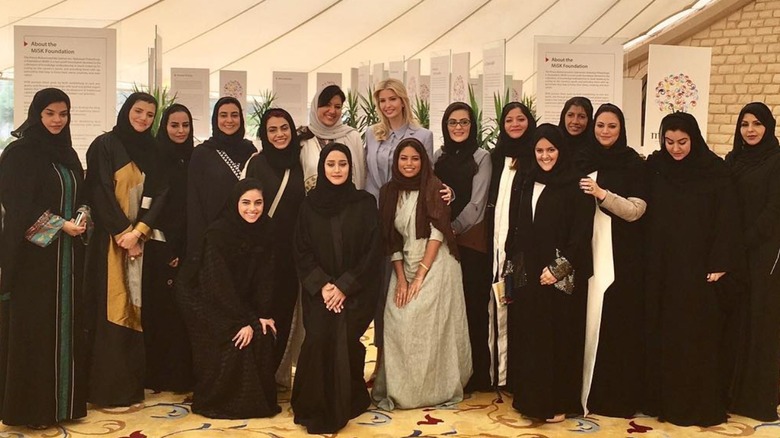 Ivanka Trump posing with 16 Saudi women