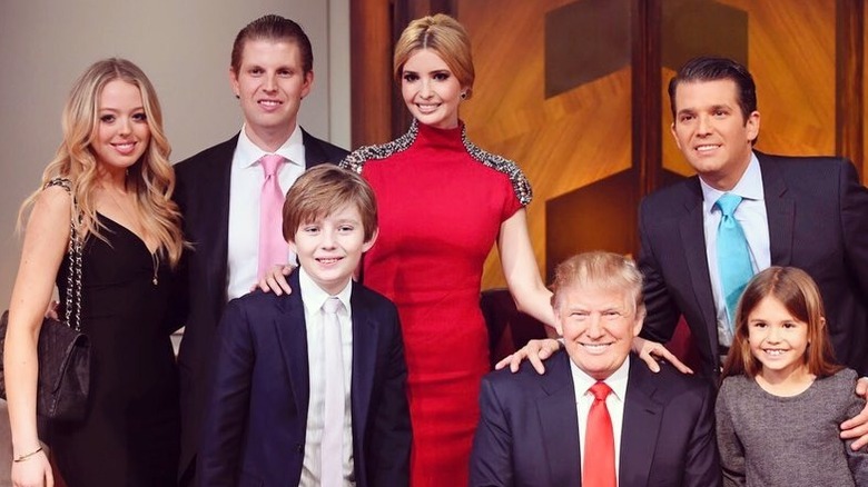 The Trump family smiles for a photo