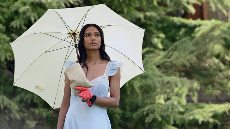 Sonya holding umbrella in Vampire Academy