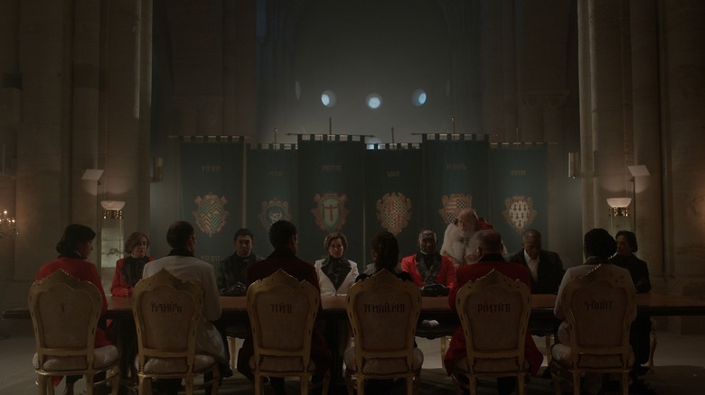 Royal Moroi sitting at table