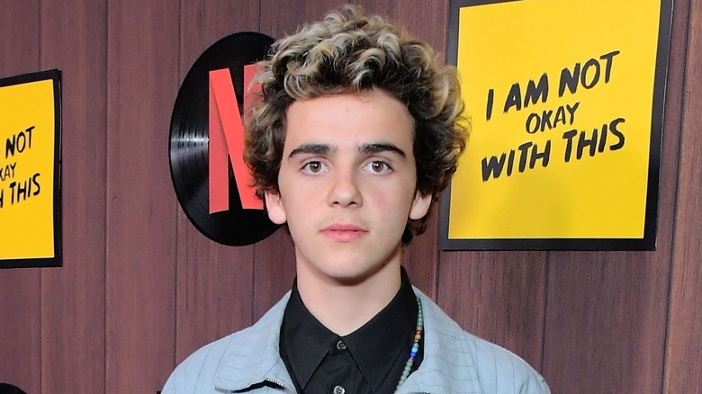Jack Dylan Grazer poses at an event