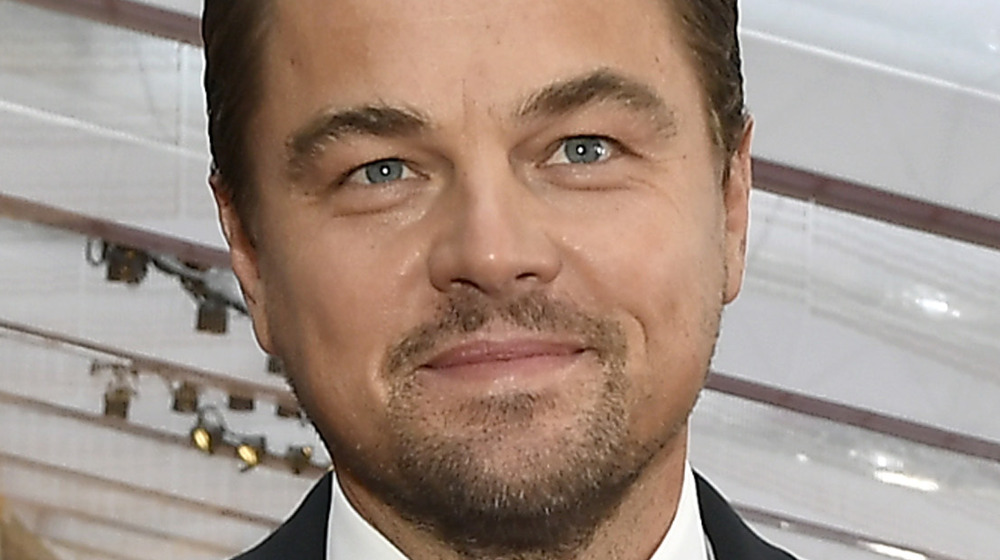 Leonardo DiCaprio smiles in a tuxedo