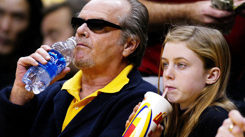 Jack Nicholson's daughter Lorraine with her father at a game
