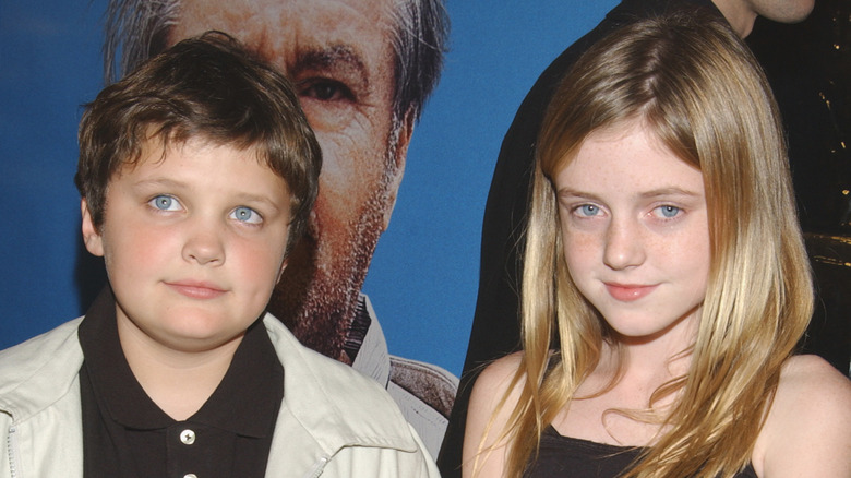 (l-r): Raymond Nicholson and Lorraine Nicholson posing on the red carpet.