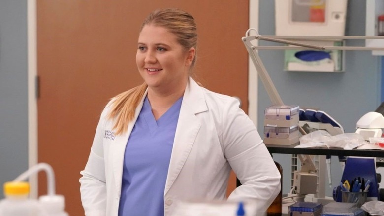 Dr. Helm smiling in scrubs