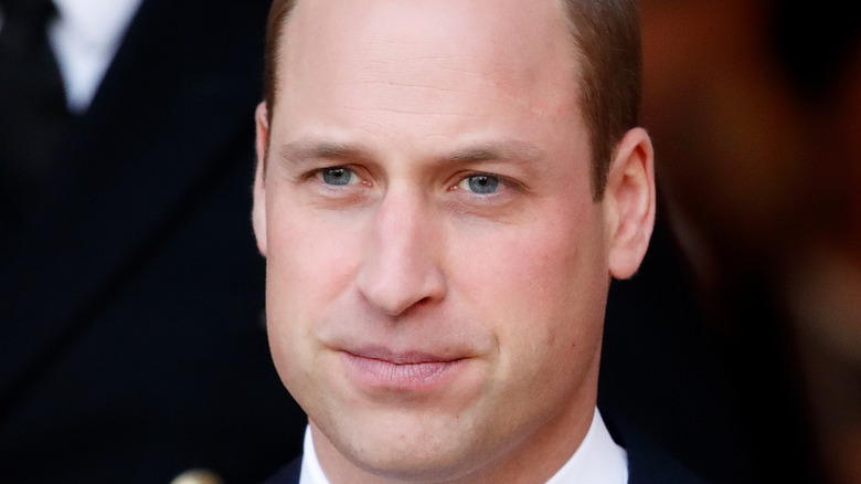 Prince William looks serious