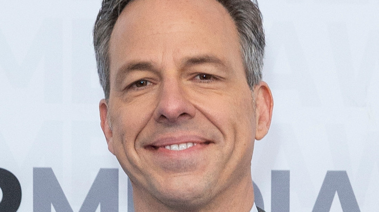 Jake Tapper posing on a red carpet 