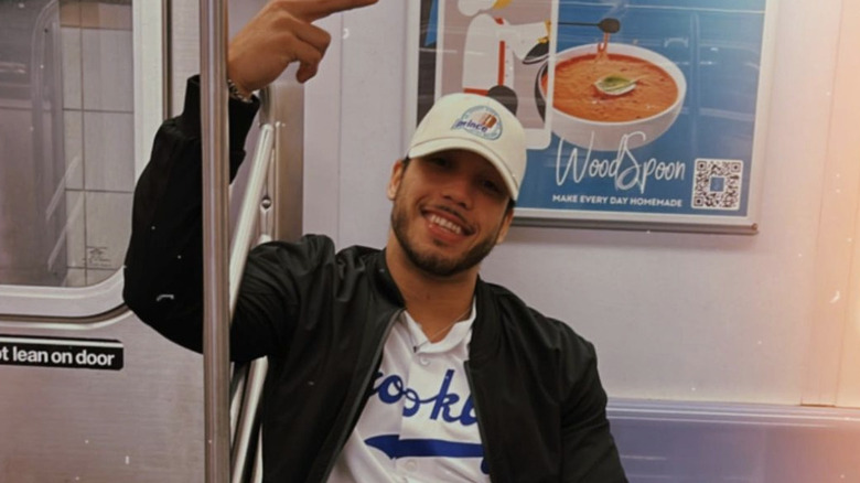 James wearing a hat
