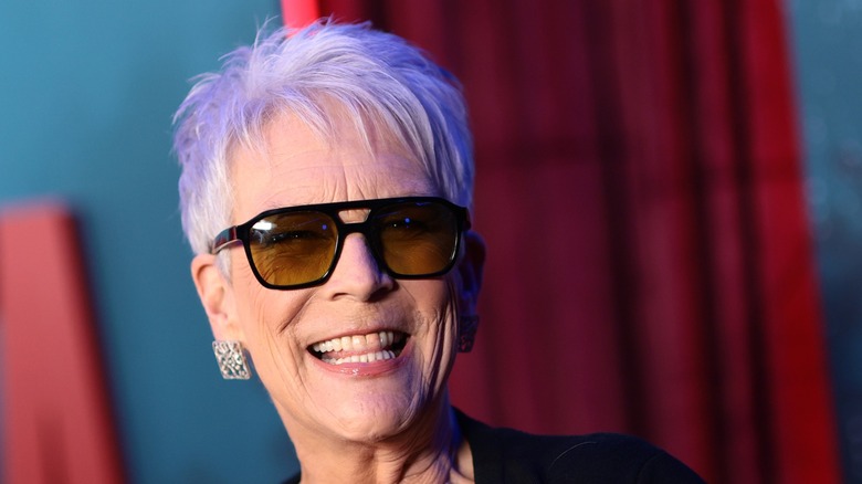 Jamie Lee Curtis smiling while wearing shades
