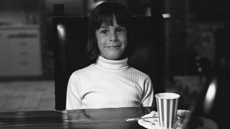 Jamie Lee Curtis posing for a picture in 1966