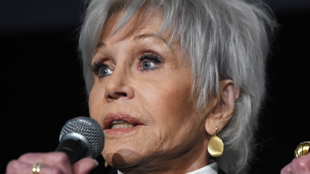 Jane Fonda speaking, short gray hair