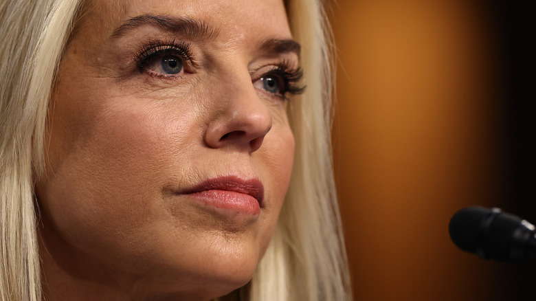 Pam Bondi at microphone