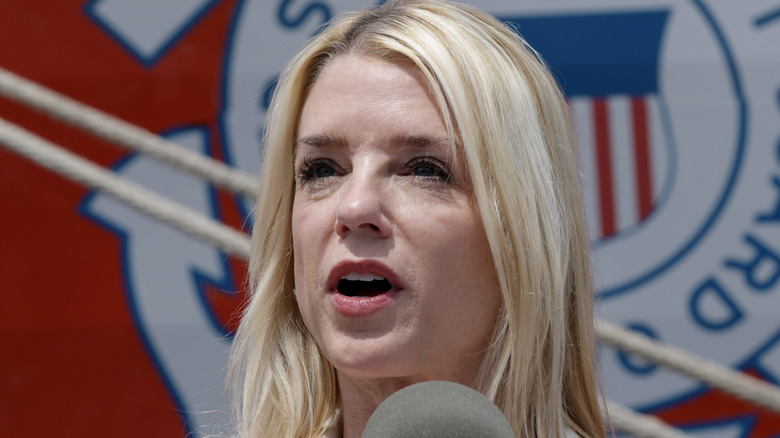Pam Bondi at microphone