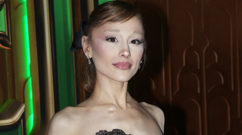 Ariana Grande posing at a Wicked event
