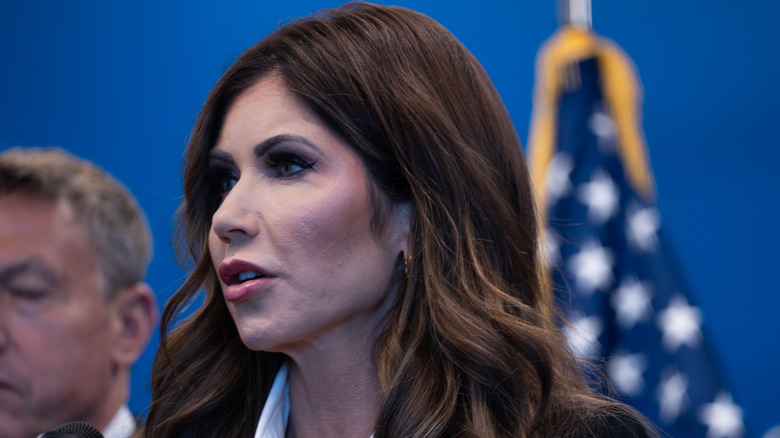 Kristi Noem talking and looking serious