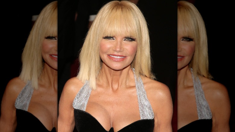 Kristin Chenoweth with bangs wearing a black dress