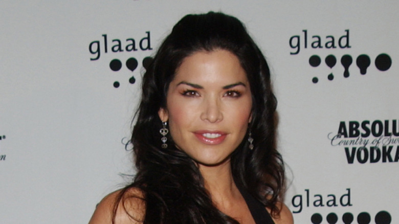 Lauren Sánchez Bezos smirking in a black dress at the GLAAD awards.