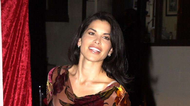 Lauren Sánchez Bezos smiling in a brown outfit while attending the Junior League of Los Angeles "Viva Los Angeles" Casino Night
