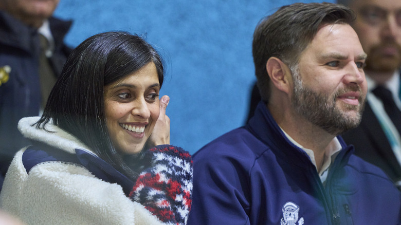 Usha and JD Vance watching Winter Olympics hockey angled right