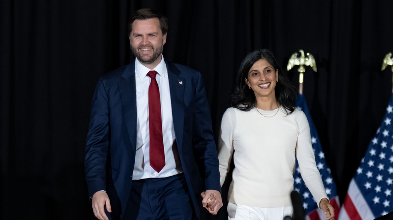 JD and Usha Vance walking hand in hand