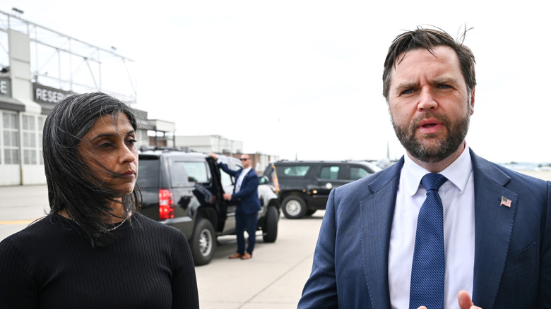 Usha Vance stands next to JD Vance