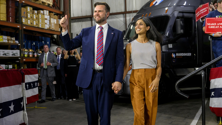 J.D. Vance and Usha Vance holding hands