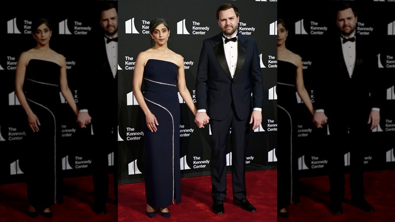 Usha and JD Vance posing while holding hands