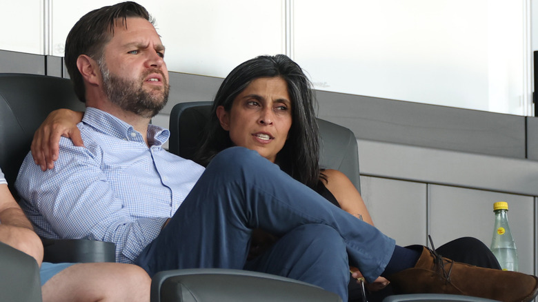 Usha Vance sitting with her arm around JD Vance