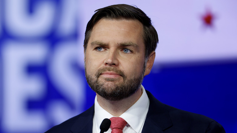 JD Vance stares off into the distance