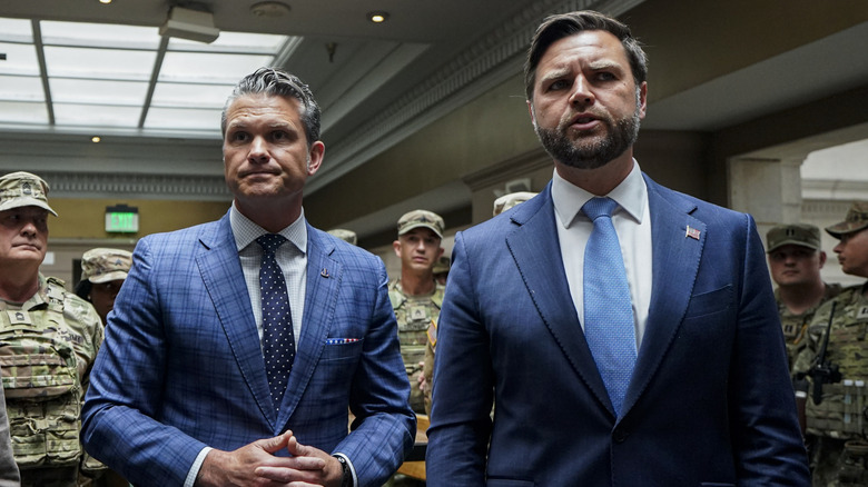 Pete Hegseth and JD Vance frowning