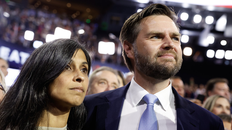 Usha and JD Vance look to the side