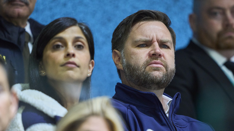 Usha Vance and JD Vance watching a hockey game at the Winter Olympics