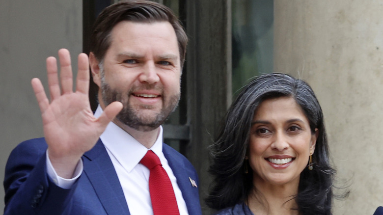 J.D. Vance waving next to Usha Vance
