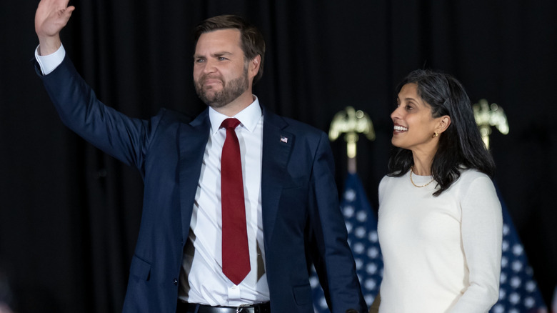 J.D. Vance waving next to Usha Vance