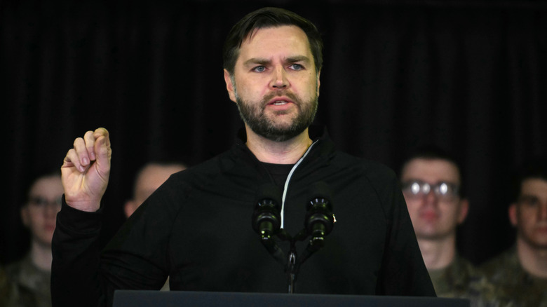 JD Vance speaks at a podium
