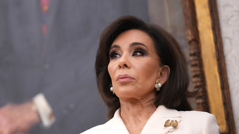 Jeanine Pirro looking to the side