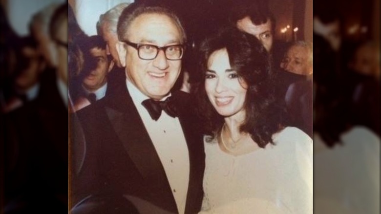 Jeanine Pirro posing with Henry Kissinger