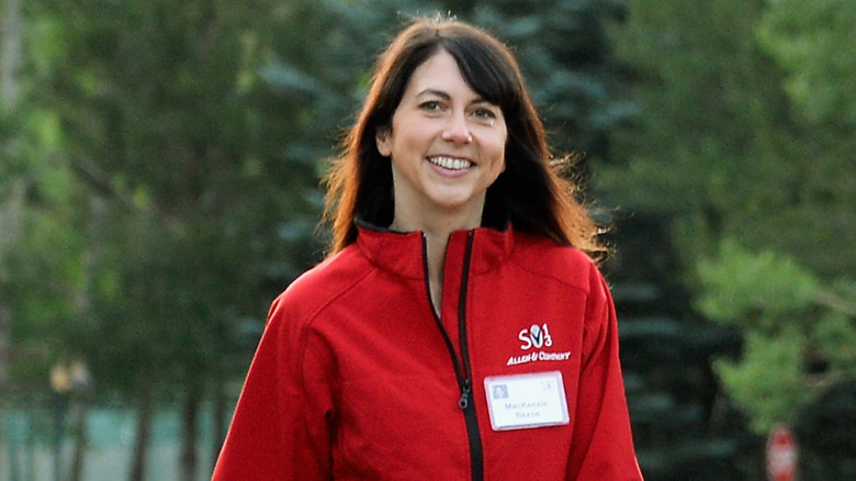 Mackenzie Scott wears a red coat outdoors at the Sun Valley Resort on July 10, 2013 in Sun Valley, Idaho.