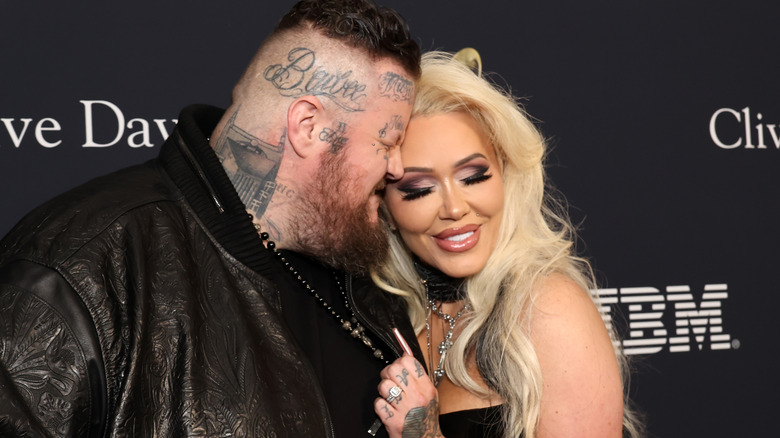 Bunnie Xo and Jelly Roll leaning in for a kiss