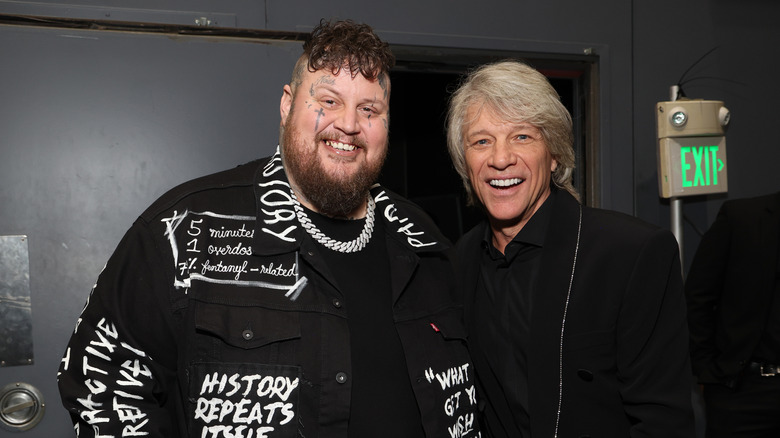 Jelly Roll posing with Jon Bon Jovi