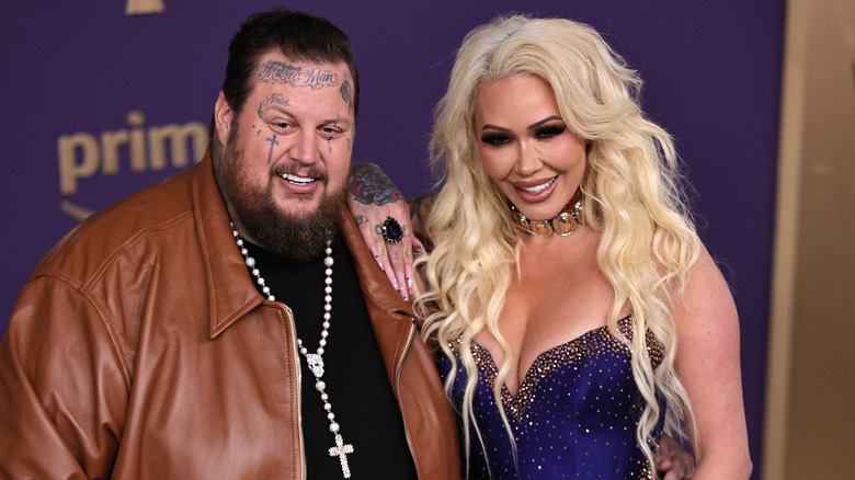 Jelly Roll and Bunnie Xo smiling while posing together