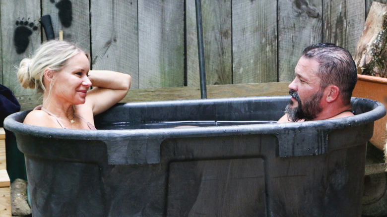 Jen and Charlie in a tub